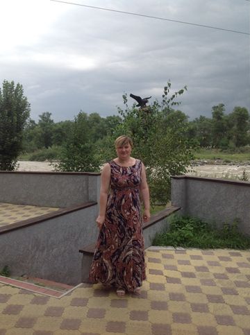На фоне реки Кубань
