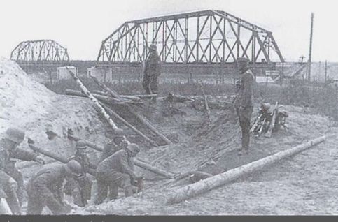 Сентябрь 1941 Левый берег Невы. Кузьминский ЖД мост